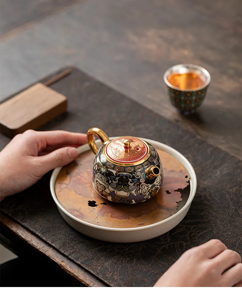 "Black Ceramic Teapot Inspired by Tibetan Thangka Art"