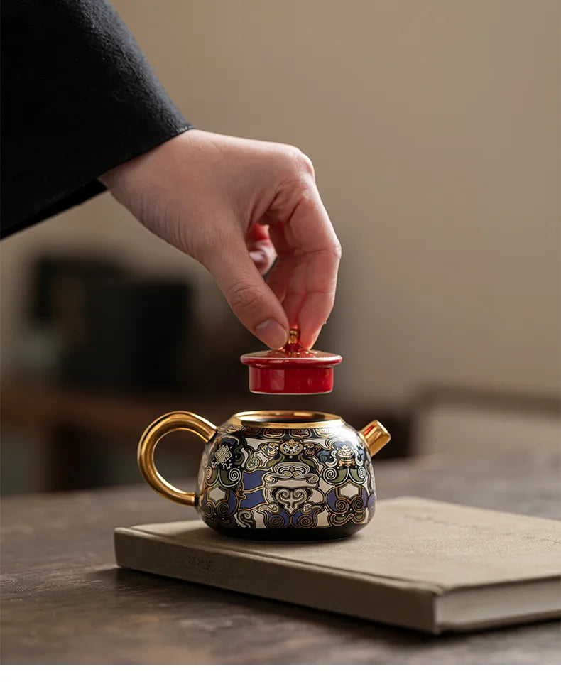 "Black Ceramic Teapot Inspired by Tibetan Thangka Art"